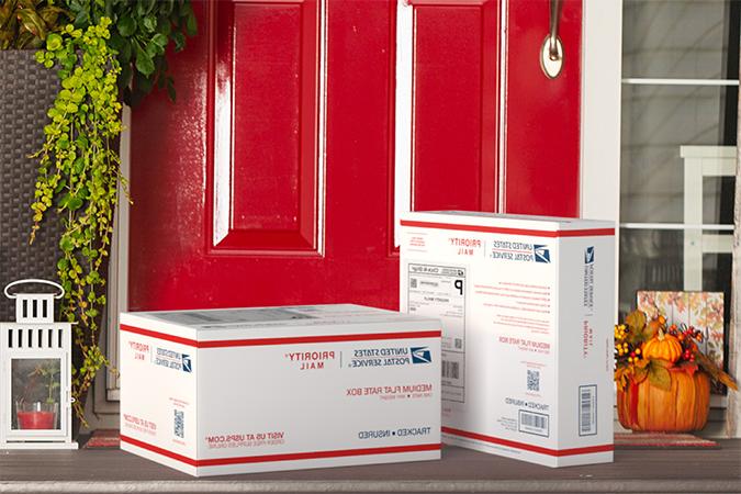 优先邮件 boxes on a house porch awaiting pickup.